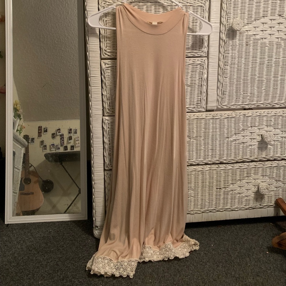 light pink dress with lace at the bottom